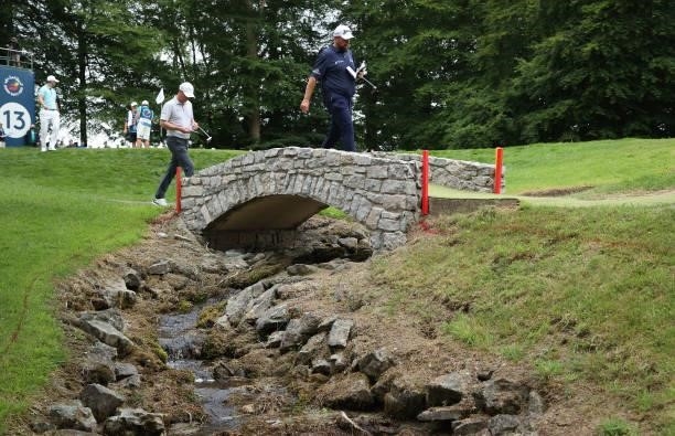 Shane Lowry of Ireland crosses a bridge on the 13th hole during Day Two of The Dubai Duty Free Irish Open at Mount Juliet Golf Club on July 02, 2021...
