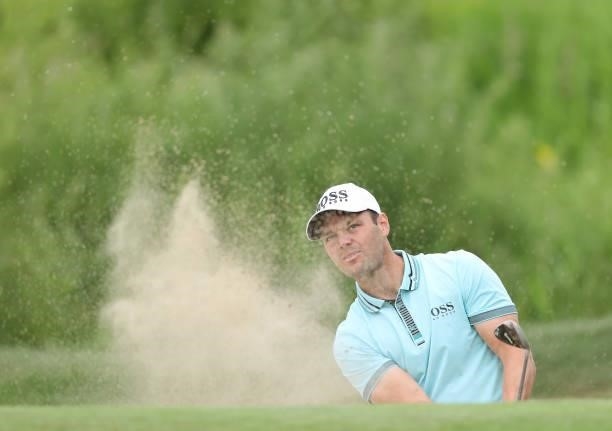 Martin Kaymer of Germany plays a bunker shot on the 18th hole during Day Two of The Dubai Duty Free Irish Open at Mount Juliet Golf Club on July 02,...