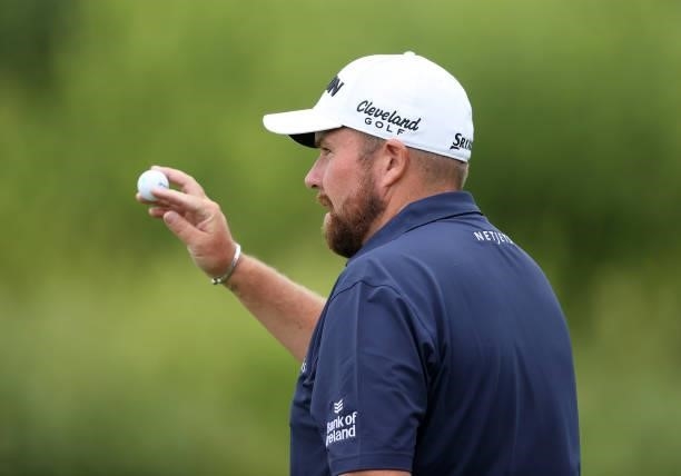 Shane Lowry of Ireland waves to the crowd on the 18th green during Day Two of The Dubai Duty Free Irish Open at Mount Juliet Golf Club on July 02,...