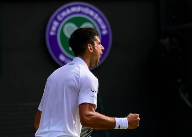 Novak Djokovic of Serbia celebrates during his match against Denis Kudla of the United States in the third round of the gentlemen's singles during...