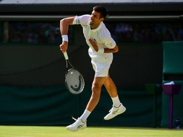 Novak Djokovic of Serbia serves against Denis Kudla of the United States in the third round of the gentlemen's singles during Day Five of The...