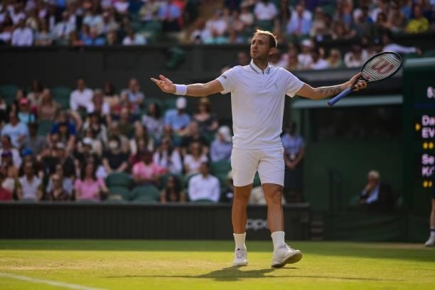 Dan Evans of Great Britain shares his frustration with his team during his match against Sebastian Korda of the United States in the third round of...