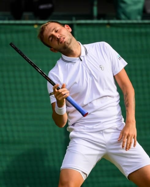 Dan Evans of Great Britain looks frustrated during his match against Sebastian Korda of the United States in the third round of the gentlemen's...