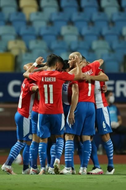 Gustavo Gomez of Paraguay celebrates with teammates after scoring the first goal of his team during a quarterfinal match between Peru and Paraguay as...