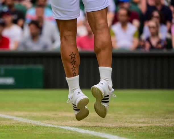 Dan Evans of Great Britain serves against Sebastian Korda of the United States in the third round of the gentlemen's singles during Day Five of The...