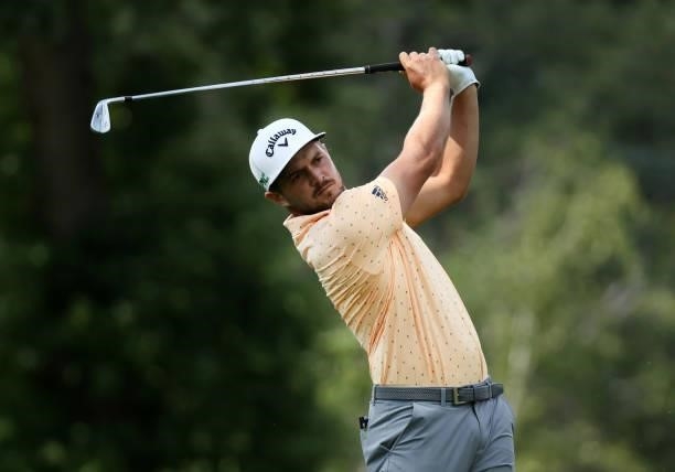 Sebastian Cappelen of Denmark plays his shot from the ninth tee during the second round of the Rocket Mortgage Classic on July 02, 2021 at the...