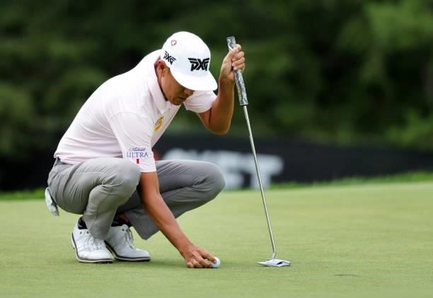 James Hahn lines up a putt on the eighth green during the second round of the Rocket Mortgage Classic on July 02, 2021 at the Detroit Golf Club in...