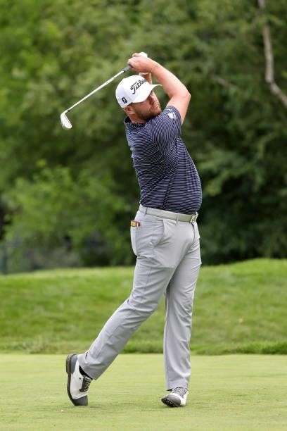 Ben Taylor of England plays his shot from the ninth tee during the second round of the Rocket Mortgage Classic on July 02, 2021 at the Detroit Golf...