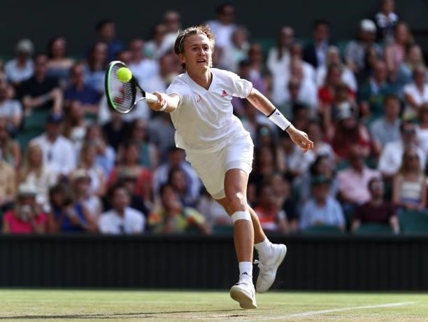 Sebastian Korda of USA returns a forehand against Daniel Evans of Great Britain during their men's singles third Round match on Day Five of The...