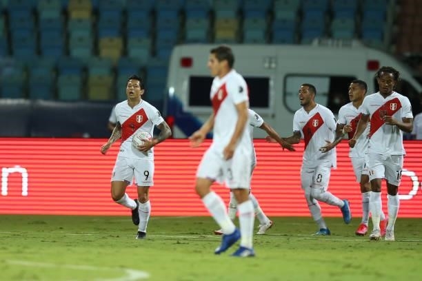 Gianluca Lapadula of Peru celebrates with teammates after scoring the first goal of his team during a quarterfinal match between Peru and Paraguay as...