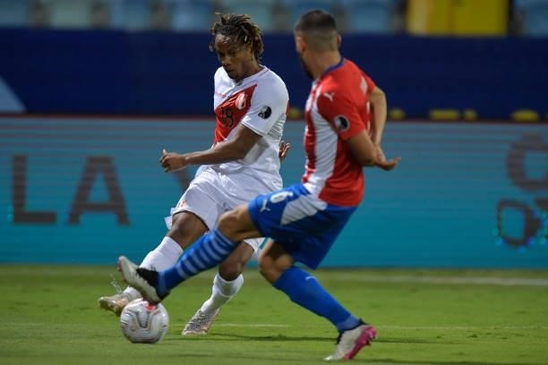 André Carrillo of Peru kicks the ball during a quarterfinal match between Peru and Paraguay as part of Copa America Brazil 2021 at Estadio Olimpico...