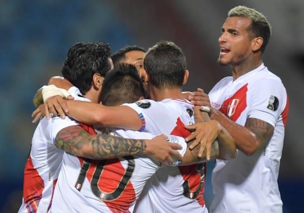 Gianluca Lapadula of Peru celebrates with teammates after scoring the second goal of his team during a quarterfinal match between Peru and Paraguay...