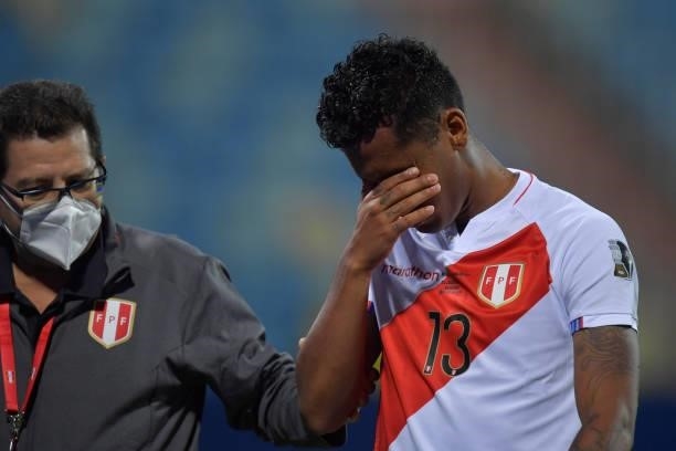 Renato Tapia of Peru reacts after suffering an injury during a quarterfinal match between Peru and Paraguay as part of Copa America Brazil 2021 at...