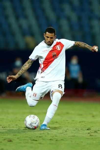 Sergio Peña of Peru kicks the ball during a quarterfinal match between Peru and Paraguay as part of Copa America Brazil 2021 at Estadio Olimpico on...