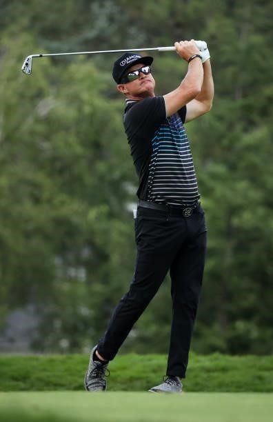Brian Gay plays his shot from the ninth tee during the second round of the Rocket Mortgage Classic on July 02, 2021 at the Detroit Golf Club in...