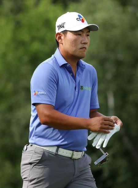 Sung Kang of South Korea walks from the ninth tee during the second round of the Rocket Mortgage Classic on July 02, 2021 at the Detroit Golf Club in...