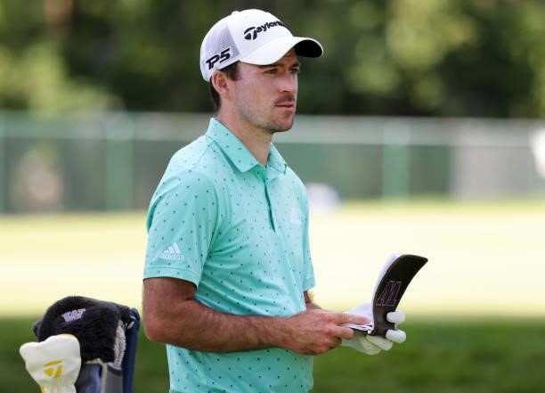 Nick Taylor of Canada plays his shot from the ninth tee during the second round of the Rocket Mortgage Classic on July 02, 2021 at the Detroit Golf...