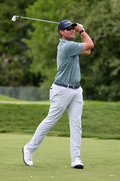 Adam Schenk plays his shot from the ninth tee during the second round of the Rocket Mortgage Classic on July 02, 2021 at the Detroit Golf Club in...