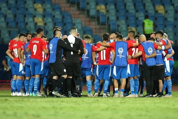 Players of Paraguay huddle before the penalty shootout after a quarterfinal match between Peru and Paraguay as part of Copa America Brazil 2021 at...