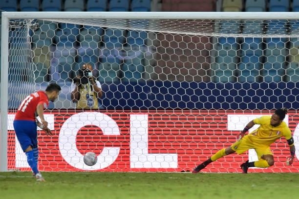 Angel Romero of Paraguay takes his penalty kick against Pedro Gallese goalkeeper of Peru during a quarterfinal match between Peru and Paraguay as...