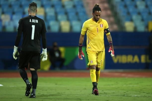 Pedro Gallese goalkeeper of Peru walks next to Antony Silva of Paraguay during a quarterfinal match between Peru and Paraguay as part of Copa America...