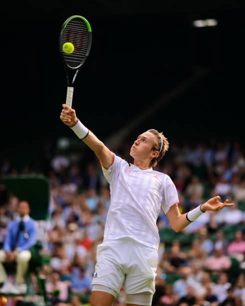 Sebastian Korda of the United hits a backhand against Dan Evans of Great Britain in the third round of the gentlemen's singles during Day Five of The...