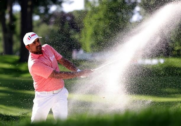 Anirban Lahiri of India plays a shot from a bunker on the eighth hole during the second round of the Rocket Mortgage Classic on July 02, 2021 at the...