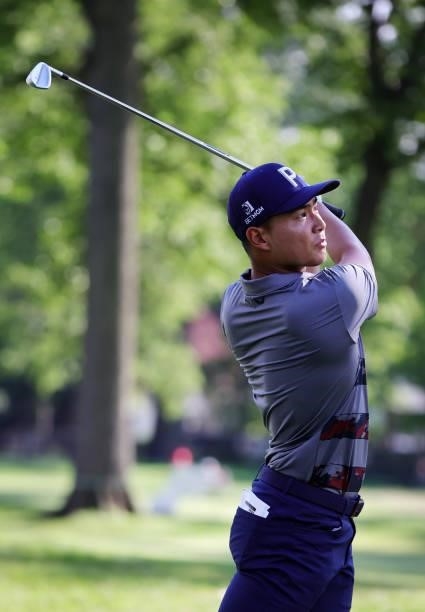 Justin Suh plays his shot from the fifth tee during the second round of the Rocket Mortgage Classic on July 02, 2021 at the Detroit Golf Club in...