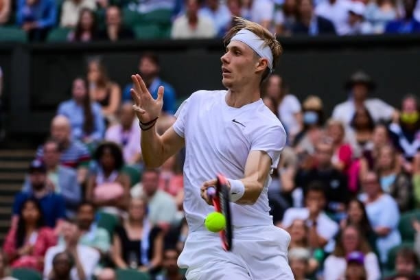 Dennis Shapovalov of Canada hits a forehand against Andy Murray of Great Britain in the third round of the gentlemen's singles during Day Five of The...