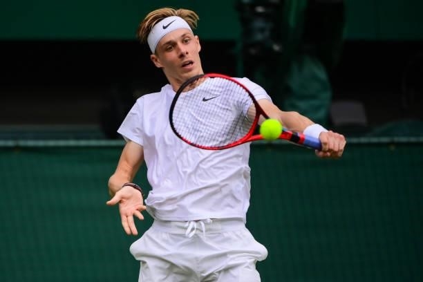 Dennis Shapovalov of Canada hits a backhand against Andy Murray of Great Britain in the third round of the gentlemen's singles during Day Five of The...