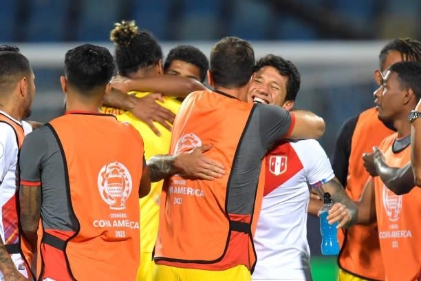 Gianluca Lapadula of Peru and teammates celebrate winning the match in a penalty shootout after a quarterfinal match between Peru and Paraguay as...