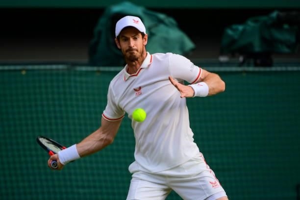 Andy Murray of Great Britain hits a forehand against Dennis Shapovalov of Canada in the third round of the gentlemen's singles during Day Five of The...
