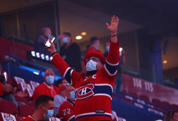 Fan awaits warmups prior to Game Three of the 2021 NHL Stanley Cup Final between the Tampa Bay Lightning and the Montreal Canadiens at Bell Centre on...