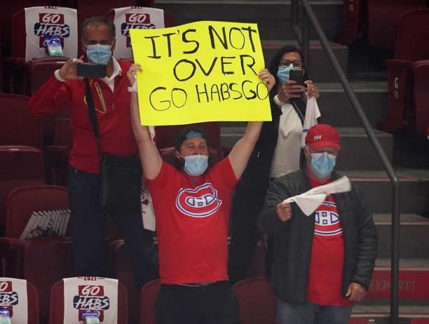 Canadiens fan holds a sign prior to Game Three of the 2021 NHL Stanley Cup Final between the Tampa Bay Lightning and the Montreal Canadiens at Bell...