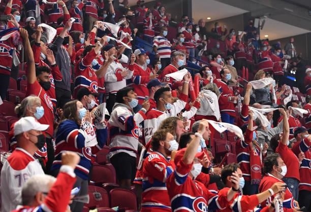 Montreal Canadiens fans cheer prior to Game Three of the 2021 NHL Stanley Cup Final against the Tampa Bay Lightning at Bell Centre on July 02, 2021...