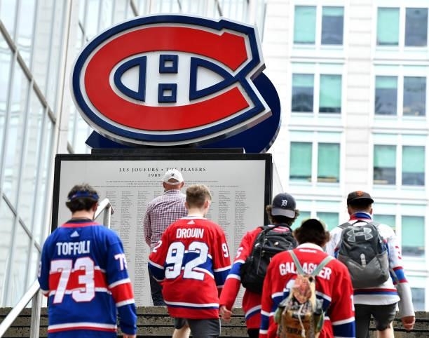 Montreal Canadiens fans walk towards Bell Centre prior to Game Three of the 2021 NHL Stanley Cup Final between the Tampa Bay Lightning and the...