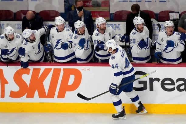 Jan Rutta of the Tampa Bay Lightning celebrates with teammates after scoring against Carey Price of the Montreal Canadiens in the first period of...