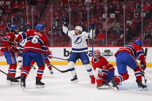 Anthony Cirelli of the Tampa Bay Lightning celebrates after teammate Victor Hedman scored against Carey Price of the Montreal Canadiens during the...
