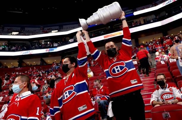 Montreal Canadiens fans get excited for Game Three of the 2021 Stanley Cup Final between the Tampa Bay Lightning and the Montreal Canadiens at Bell...