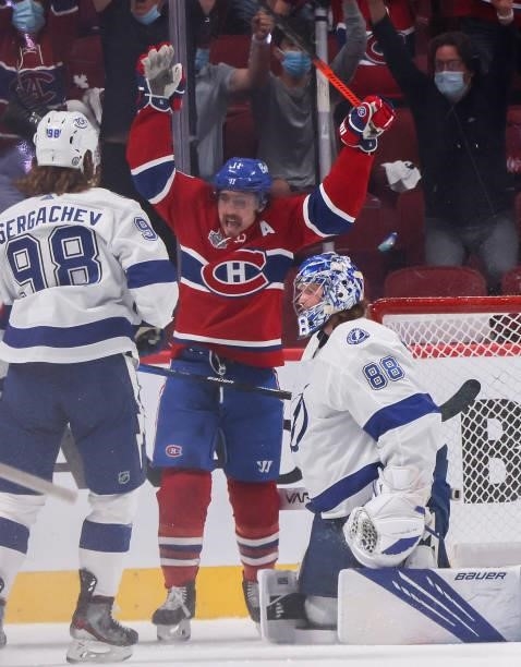 Brendan Gallagher of the Montreal Canadiens celebrates after teammate Phillip Danault scored against Andrei Vasilevskiy of the Tampa Bay Lightning...