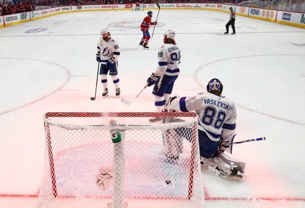 Andrei Vasilevskiy of the Tampa Bay Lightning reacts after a goal hit by Phillip Danault of the Montreal Canadiens is scored during the first period...