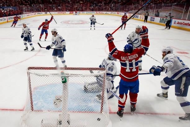 Brendan Gallagher of the Montreal Canadiens celebrates a goal hit by teammate Phillip Danault against Andrei Vasilevskiy of the Tampa Bay Lightning...