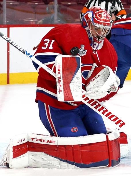 Goaltender Carey Price of the Montreal Canadiens makes a save against the Tampa Bay Lightning during the first period of Game Three of the 2021...