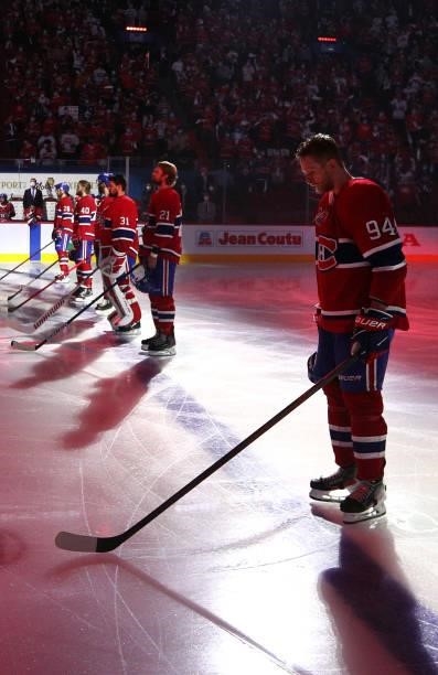 Corey Perry and the Montreal Canadiens starting line up stand on the blue line during pregame for Game Three of the 2021 Stanley Cup Final between...