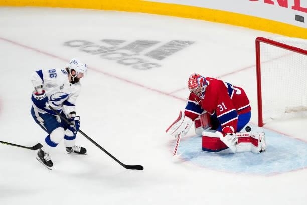 Carey Price of the Montreal Canadiens makes the save against Nikita Kucherov of the Tampa Bay Lightning during the first period in Game Three of the...