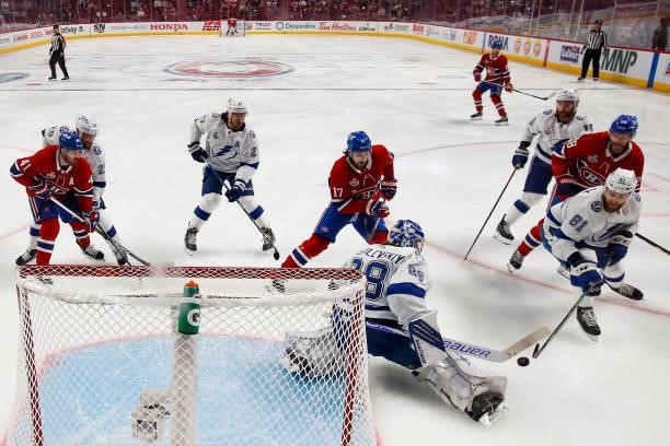 Andrei Vasilevskiy of the Tampa Bay Lightning blocks a shot during the first period in Game Three of the 2021 NHL Stanley Cup Final against the...