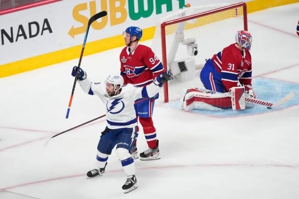 Tyler Johnson of the Tampa Bay Lightning reacts after scoring against Carey Price of the Montreal Canadiens during the second period in Game Three of...