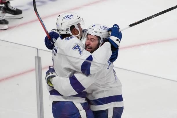 Tyler Johnson of the Tampa Bay Lightning celebrates with Mathieu Joseph after scoring against Carey Price of the Montreal Canadiens during the second...