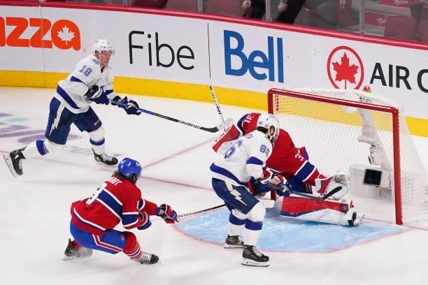 Nikita Kucherov of the Tampa Bay Lightning scores against Carey Price of the Montreal Canadiens during the second period in Game Three of the 2021...
