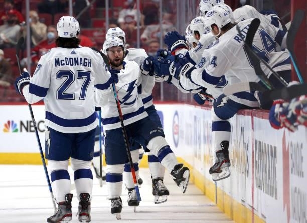 Tyler Johnson of the Tampa Bay Lightning celebrates his goal against the Montreal Canadiens with teammates during the second period of Game Three of...